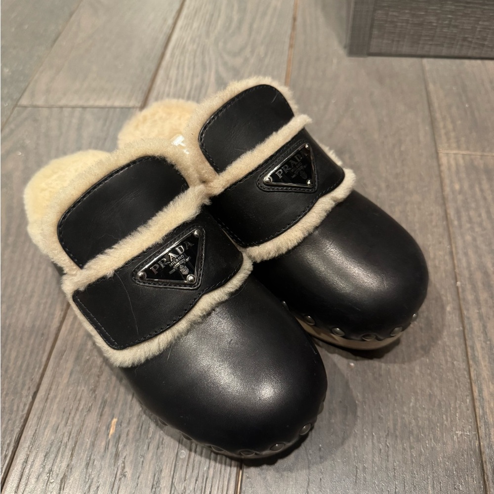 Prada shearling clogs
